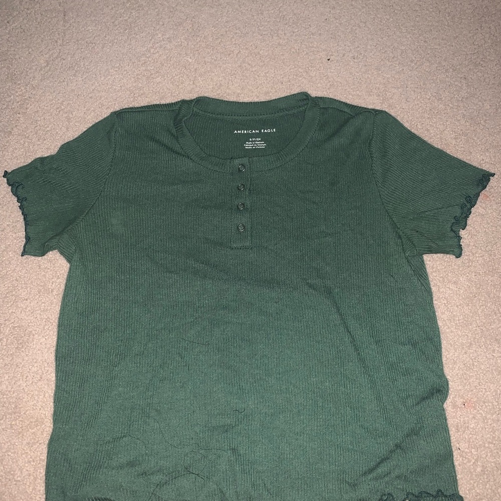 4 button green top